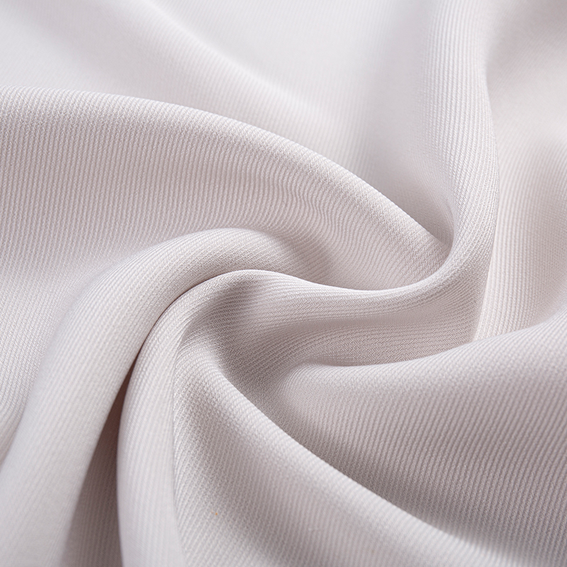 Komposiittifilamenttipuuvilla-tuntuva iso twill-kangas